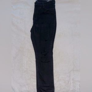 Black distressed skinny jeans